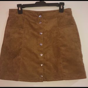 Suede button up mini skirt.
